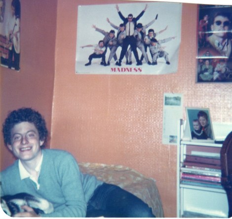 Those posters were stuck to the wall using pins ... yes PINS